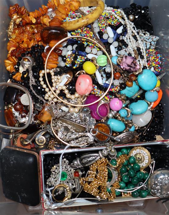 A large quantity of mixed costume jewellery, including silver. amber, malachite etc.